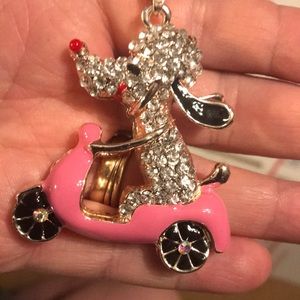 Doggy on pink scooter necklace